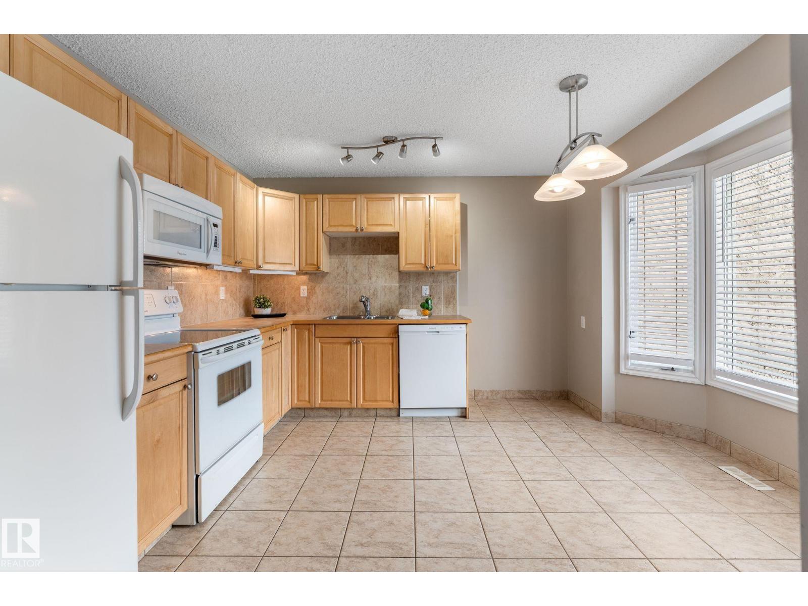 14106 22a St Nw, Edmonton, Alberta  T5Y 1E1 - Photo 9 - E4476936