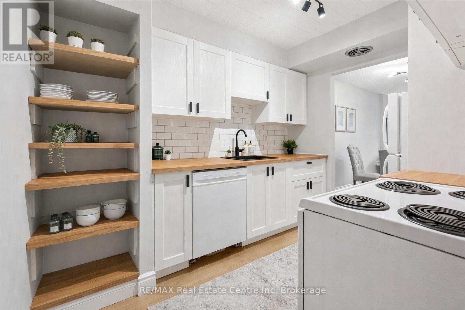 102 - 105 Conroy Crescent, Guelph (Dovercliffe Park/old University), Ontario  N1G 2V5 - Photo 9 - X12697226