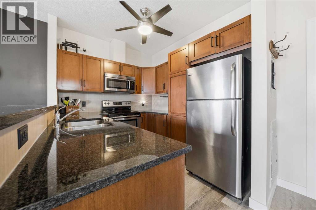 310, 76 Panatella Road Nw, Calgary, Alberta  T3K 0V4 - Photo 5 - A2290361