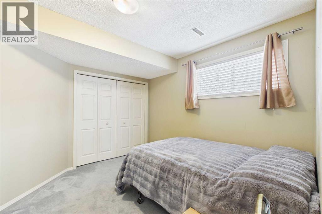 70 Riverview Circle, Cochrane, Alberta  T4C 1K3 - Photo 34 - A2292705