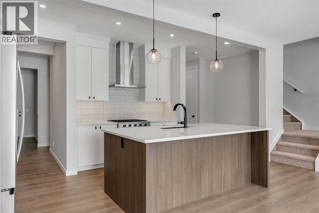 108 Creekview Manor Sw, Calgary, Alberta  T2X 4Y1 - Photo 8 - A2271874