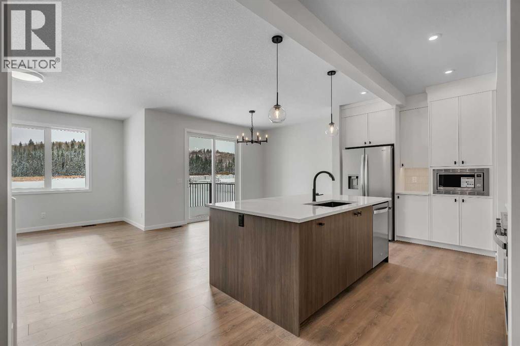 108 Creekview Manor Sw, Calgary, Alberta  T2X 4Y1 - Photo 5 - A2271874