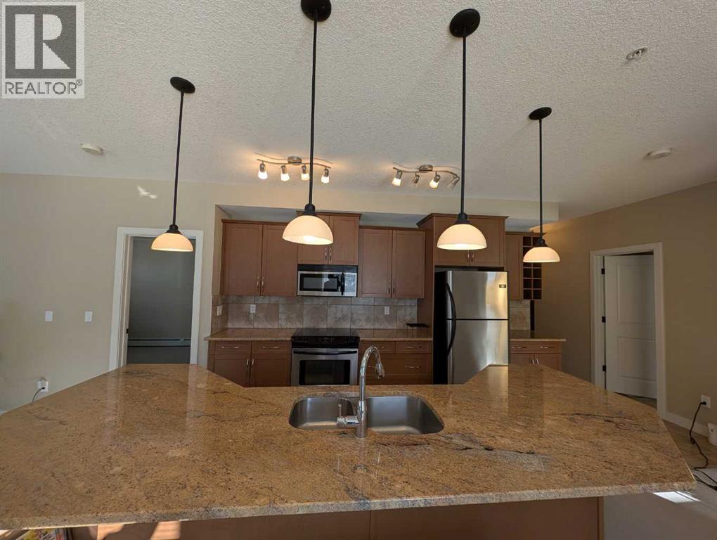 203, 35 Aspenmont Heights Sw, Calgary, Alberta  T3H 0E5 - Photo 3 - A2291530