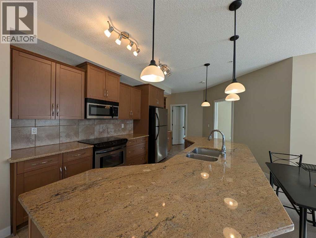 203, 35 Aspenmont Heights Sw, Calgary, Alberta  T3H 0E5 - Photo 5 - A2291530