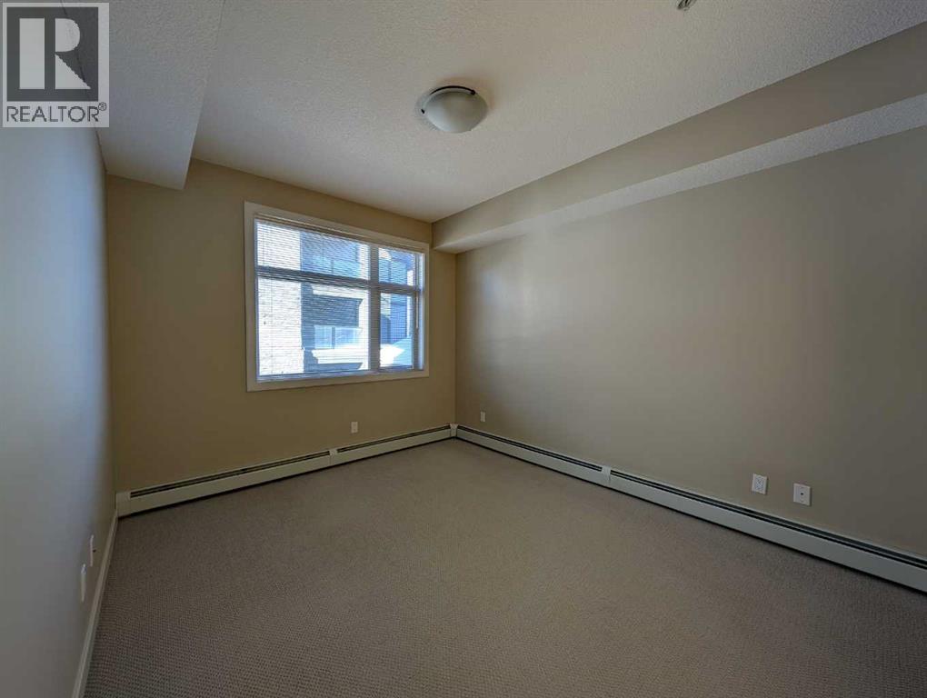 203, 35 Aspenmont Heights Sw, Calgary, Alberta  T3H 0E5 - Photo 11 - A2291530