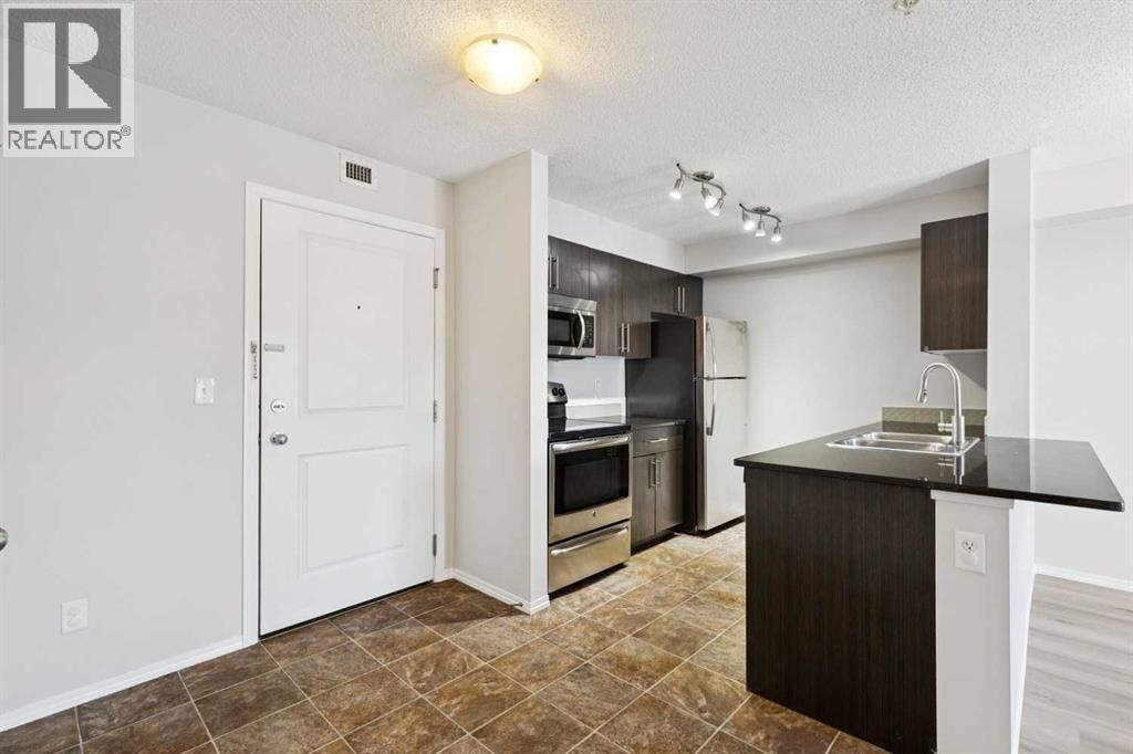 8304, 403 Mackenzie Way Sw, Airdrie, Alberta  T4B 3V7 - Photo 3 - A2291126