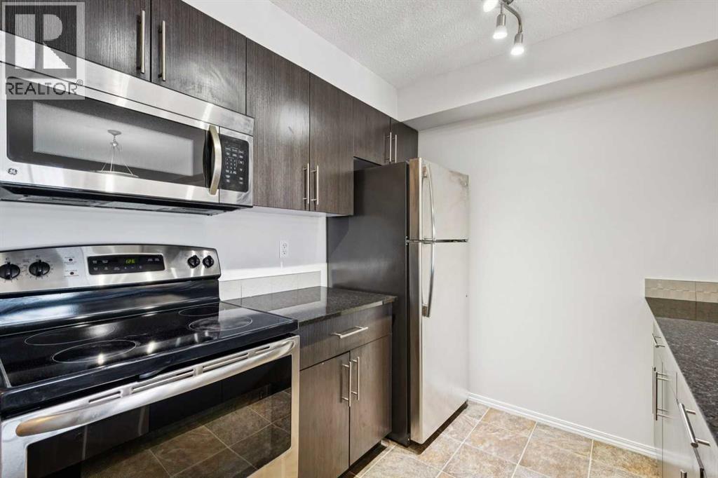 8304, 403 Mackenzie Way Sw, Airdrie, Alberta  T4B 3V7 - Photo 6 - A2291126