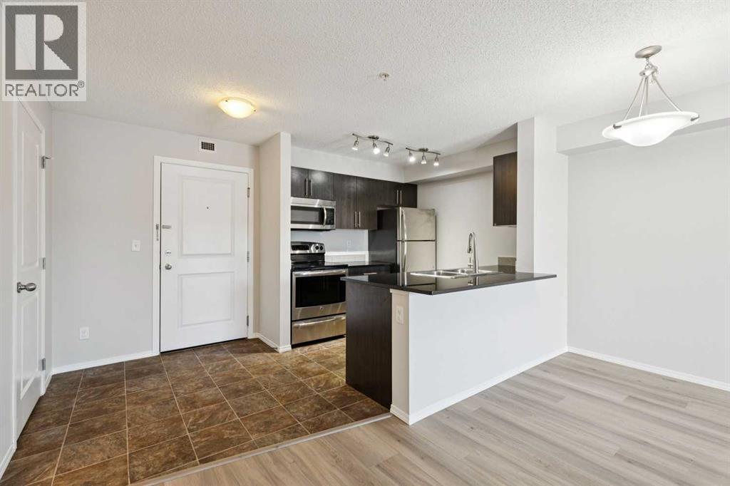 8304, 403 Mackenzie Way Sw, Airdrie, Alberta  T4B 3V7 - Photo 4 - A2291126