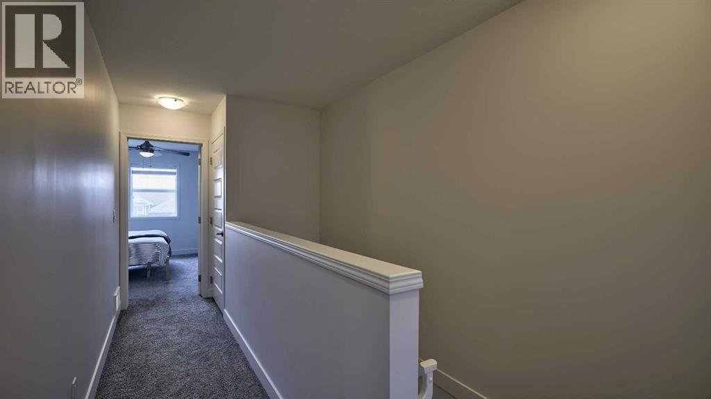 703, 1086 Williamstown Boulevard Nw, Airdrie, Alberta  T4B 3T8 - Photo 22 - A2281960