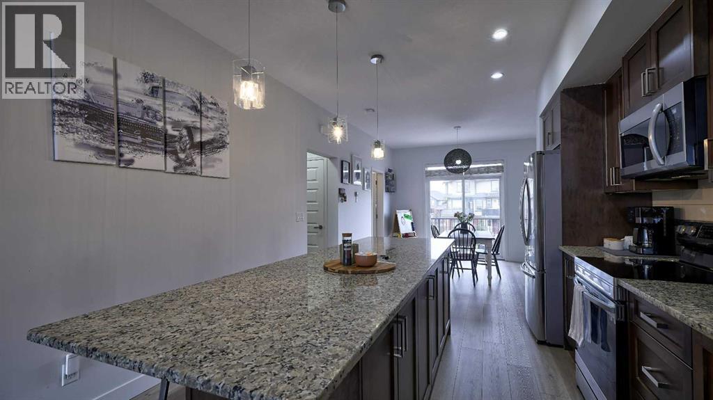 703, 1086 Williamstown Boulevard Nw, Airdrie, Alberta  T4B 3T8 - Photo 7 - A2281960