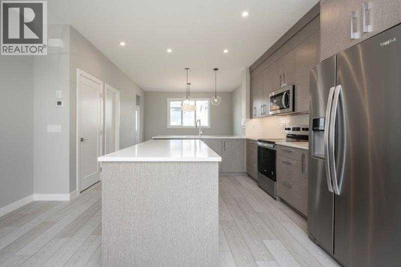 141 Dawson Wharf View, Chestermere, Alberta  T1X 2W1 - Photo 4 - A2289344