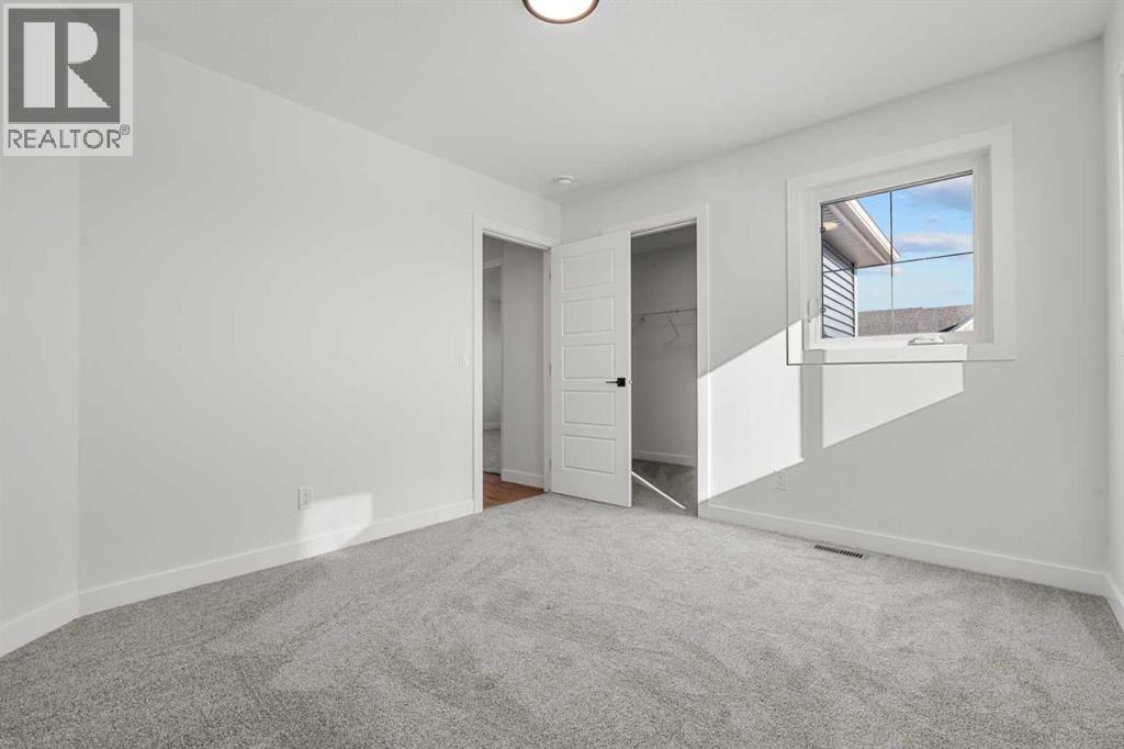 512 Lawthorn Way Se, Airdrie, Alberta  T4A 3N9 - Photo 33 - A2292536