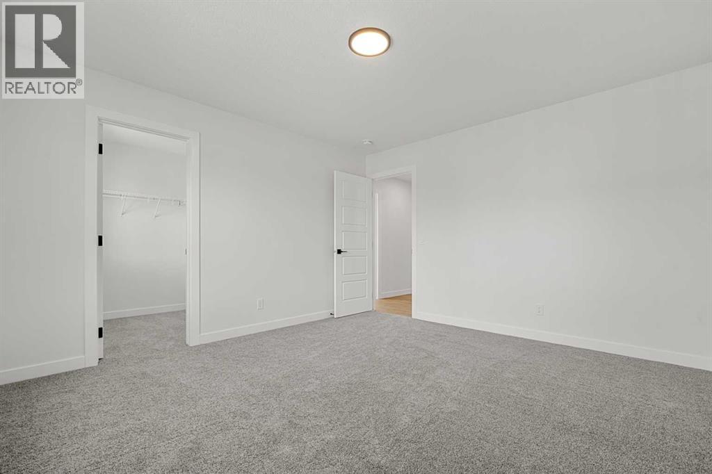 512 Lawthorn Way Se, Airdrie, Alberta  T4A 3N9 - Photo 32 - A2292536