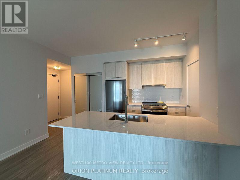 1401 - 430 Square One Drive, Mississauga, Ontario  L5B 3Y1 - Photo 2 - W12873912