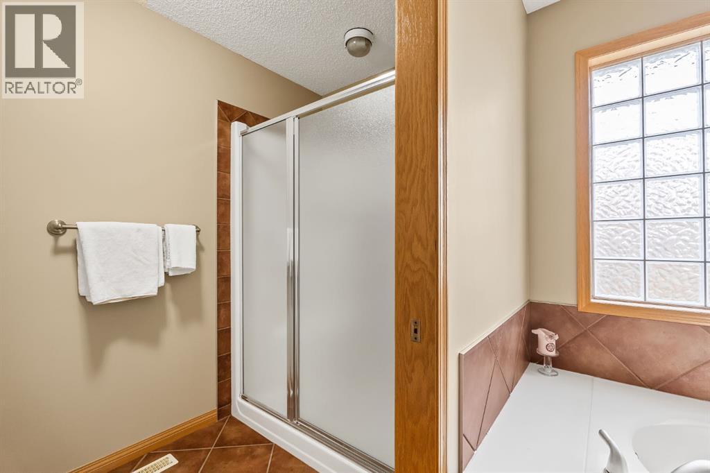 120 Simcoe Close Sw, Calgary, Alberta  T3H 4N3 - Photo 21 - A2292003