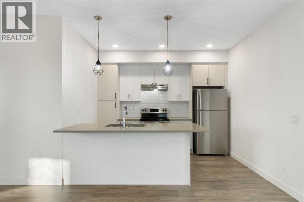 404, 24 Rivercrest Drive, Cochrane, Alberta  T4C 2C5 - Photo 13 - A2292815