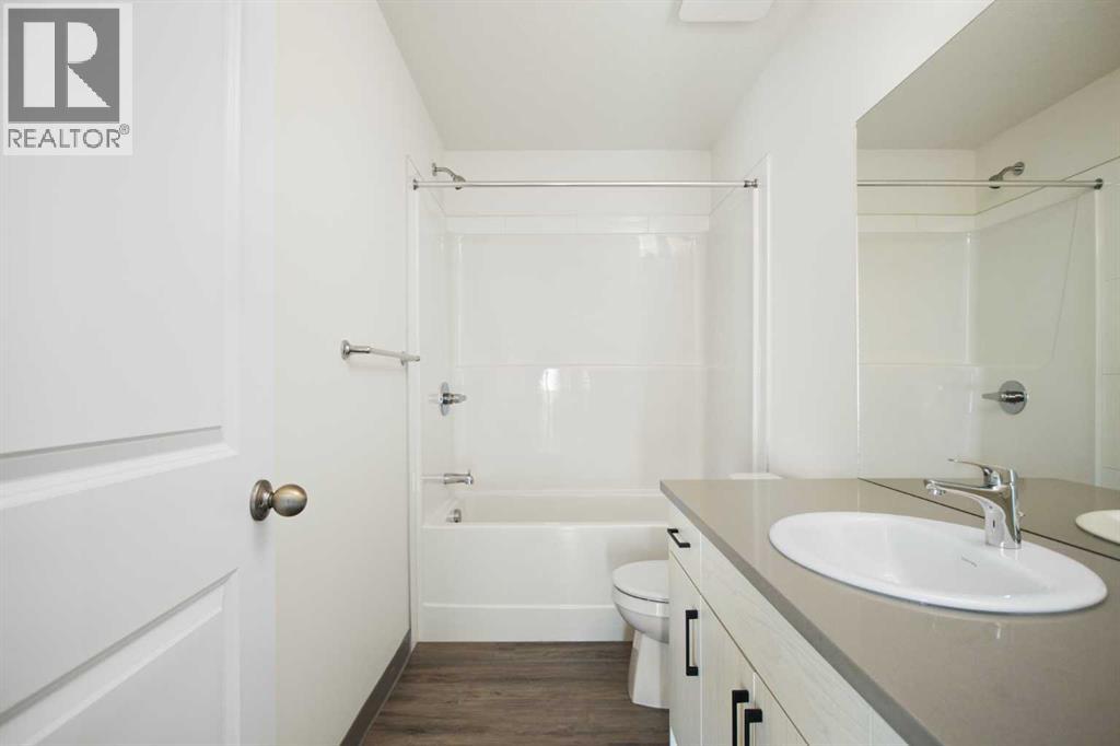 404, 24 Rivercrest Drive, Cochrane, Alberta  T4C 2C5 - Photo 21 - A2292815