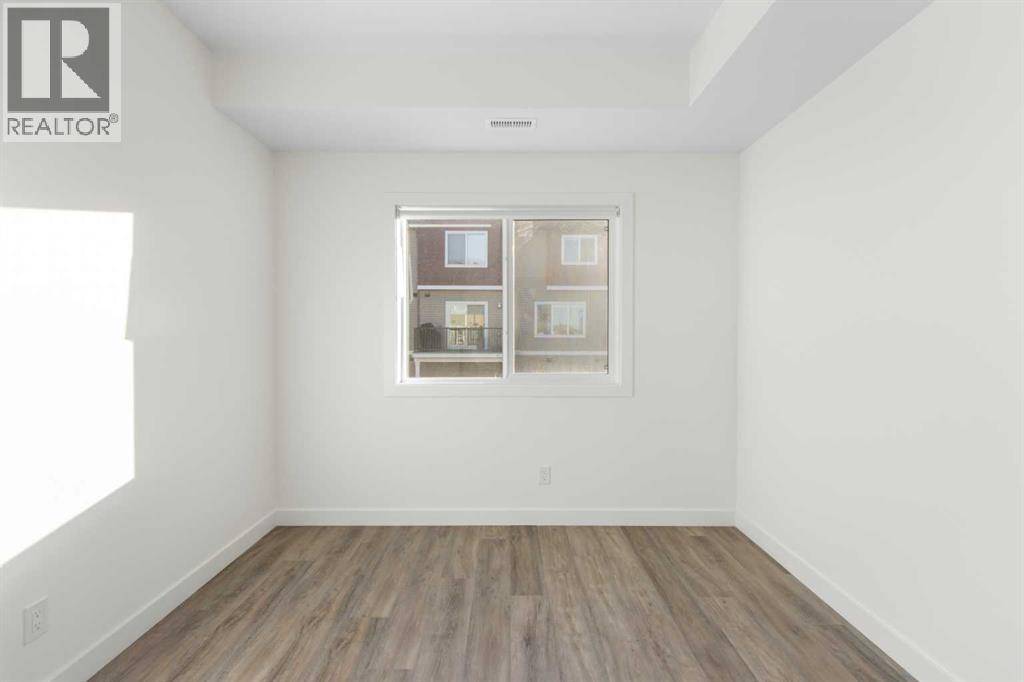 404, 24 Rivercrest Drive, Cochrane, Alberta  T4C 2C5 - Photo 23 - A2292815