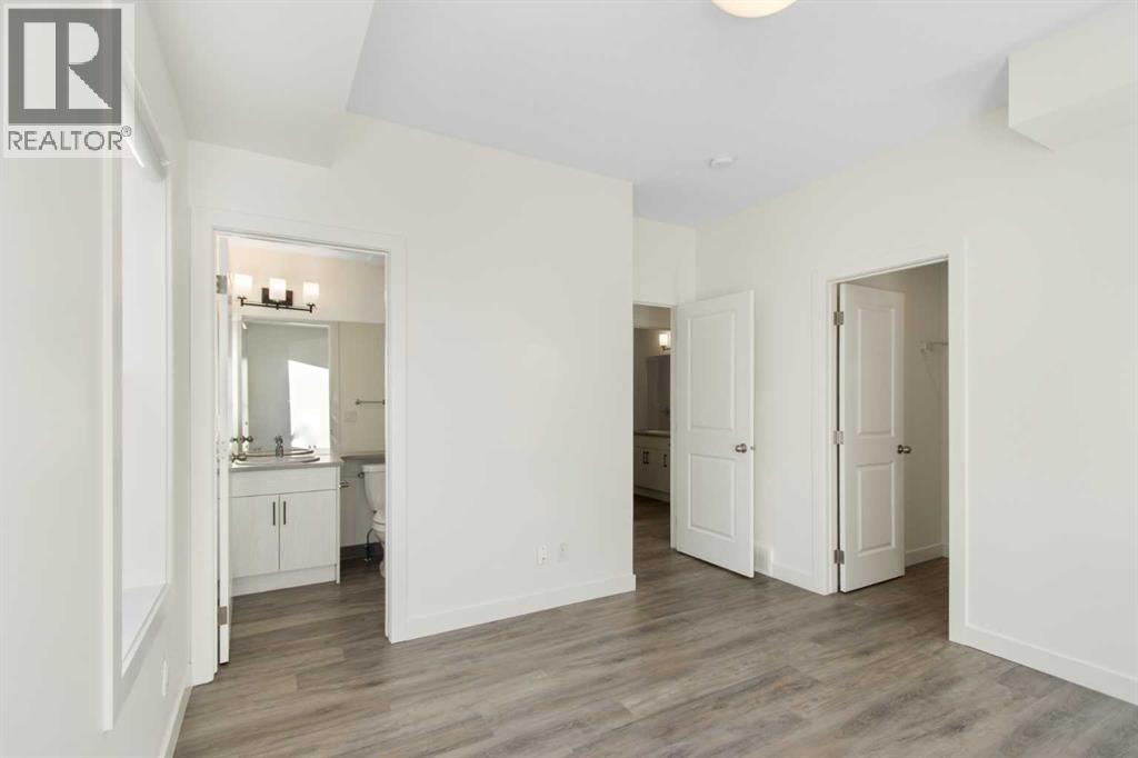 404, 24 Rivercrest Drive, Cochrane, Alberta  T4C 2C5 - Photo 27 - A2292815