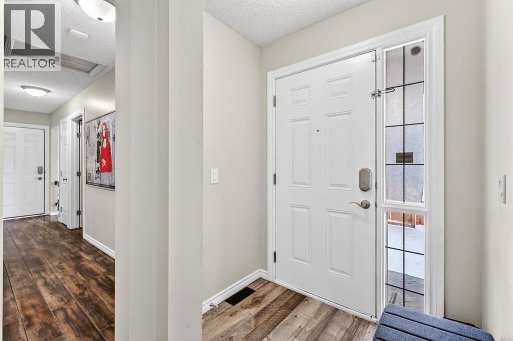 108 Cimarron Grove Circle, Okotoks, Alberta  T1S 2L9 - Photo 4 - A2292242