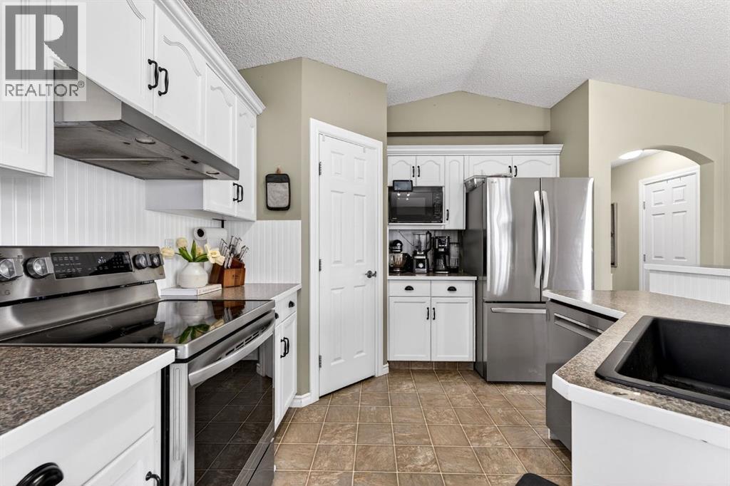 108 Cimarron Grove Circle, Okotoks, Alberta  T1S 2L9 - Photo 6 - A2292242