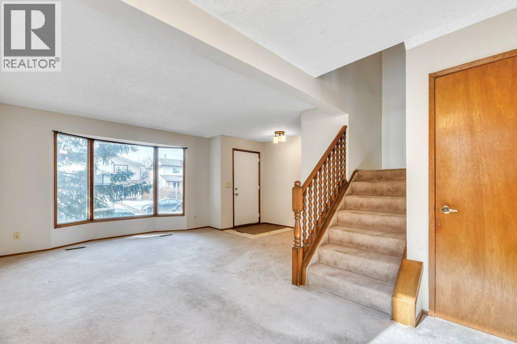 56 Cedarwood Hill Sw, Calgary, Alberta  T2W 3H5 - Photo 10 - A2291326