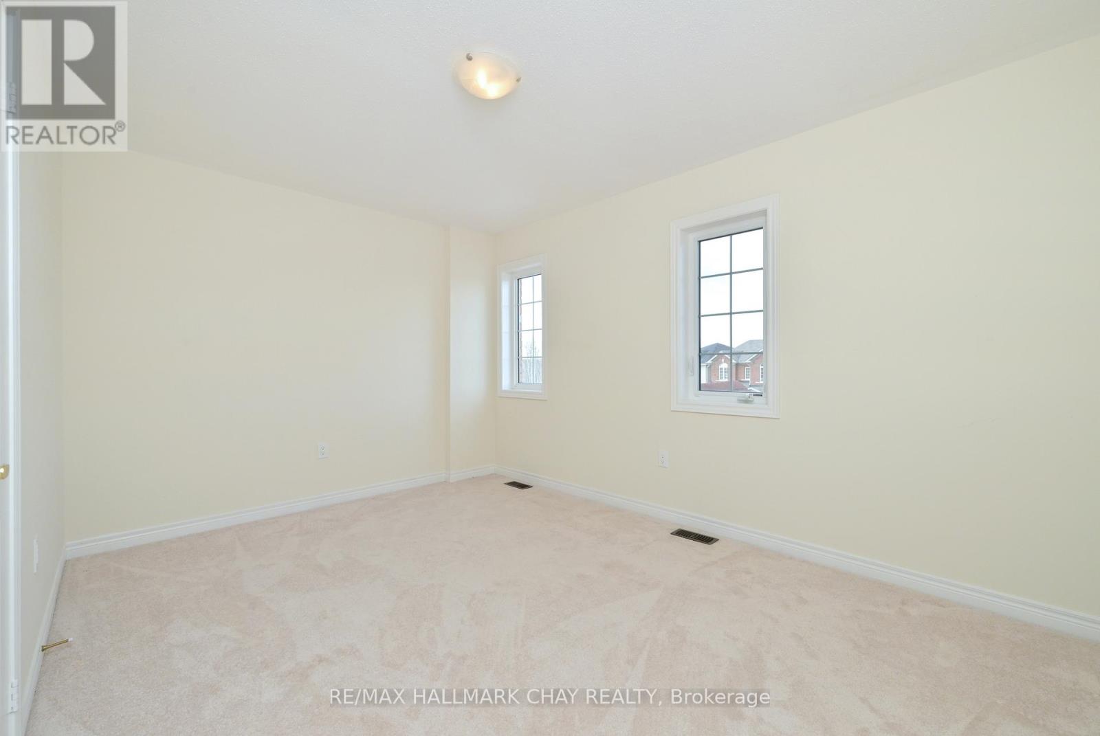 25 Mandley Street, Essa, Ontario  L3W 0B6 - Photo 24 - N12874546