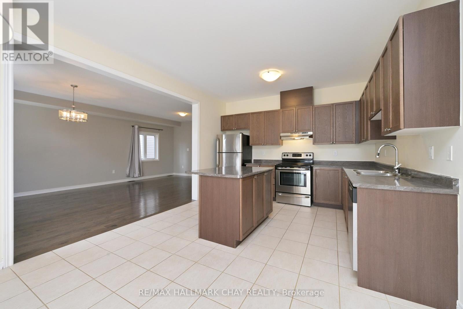 25 Mandley Street, Essa, Ontario  L3W 0B6 - Photo 7 - N12874546