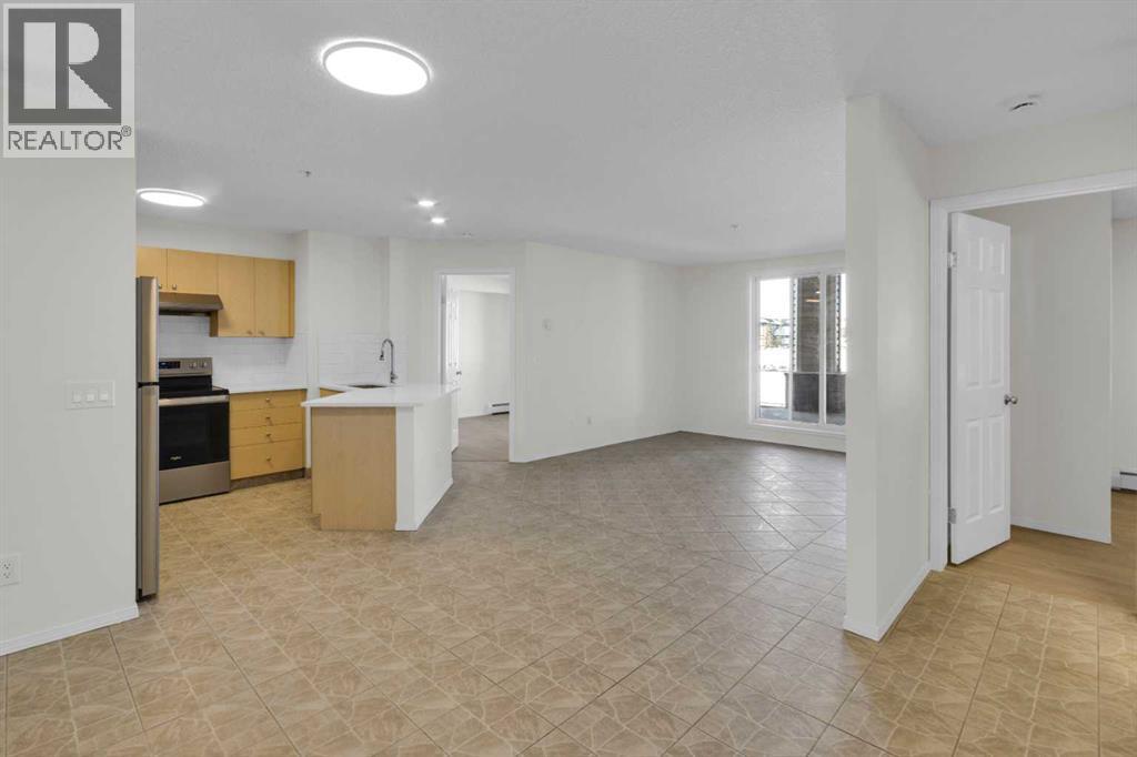 104, 16 Country Village Bay Ne, Calgary, Alberta  T3K 5Y9 - Photo 6 - A2289125