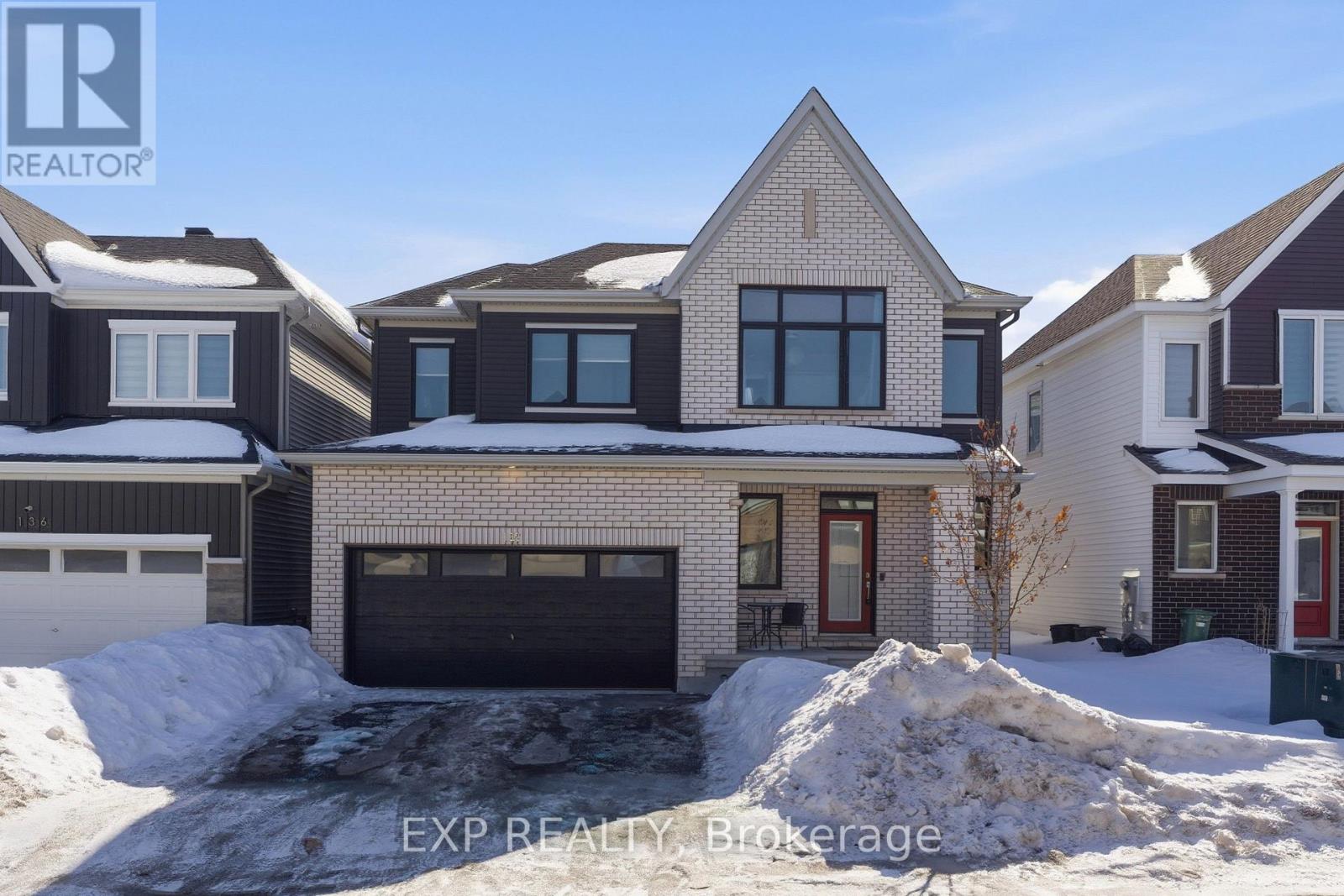 Welcome to 132 Rugosa Street, a Caivan-built home with 4 bedrooms and 3 bathrooms in one of Barrhaven's newest communities. From the moment you walk in, the quality of the finishes and the thoughtfulness of the layout make a strong first impression. The main level greets you with a welcoming foyer, a nearby powder room, and a mudroom with direct access to the double-car garage. The open-concept layout flows effortlessly from room to room, with hardwood floors underfoot and light pouring in from every angle. The kitchen is the true centrepiece, featuring floor-to-ceiling cabinetry in a striking dark finish, a scalloped tile backsplash, granite countertops, a large island with bar seating, and the full Cafe Line appliance package including a gas stove. The living room is where this home really shines, bathed in natural sunlight throughout the day and anchored by a sleek fireplace that adds warmth and ambiance year-round. Patio doors off the dining area connect you directly to the backyard, making indoor-outdoor living easy. Upstairs, the primary suite is a true retreat with a walk-in closet and a 4-piece ensuite featuring a double vanity and glass shower. Three additional spacious bedrooms and a full bathroom complete the upper level. The fully finished basement offers a large recreation room ready to adapt to your lifestyle, along with laundry and plenty of storage. Steps from parks, schools, walking trails, and everyday conveniences, this home puts you right in the heart of a thriving Barrhaven community. (id:48254)