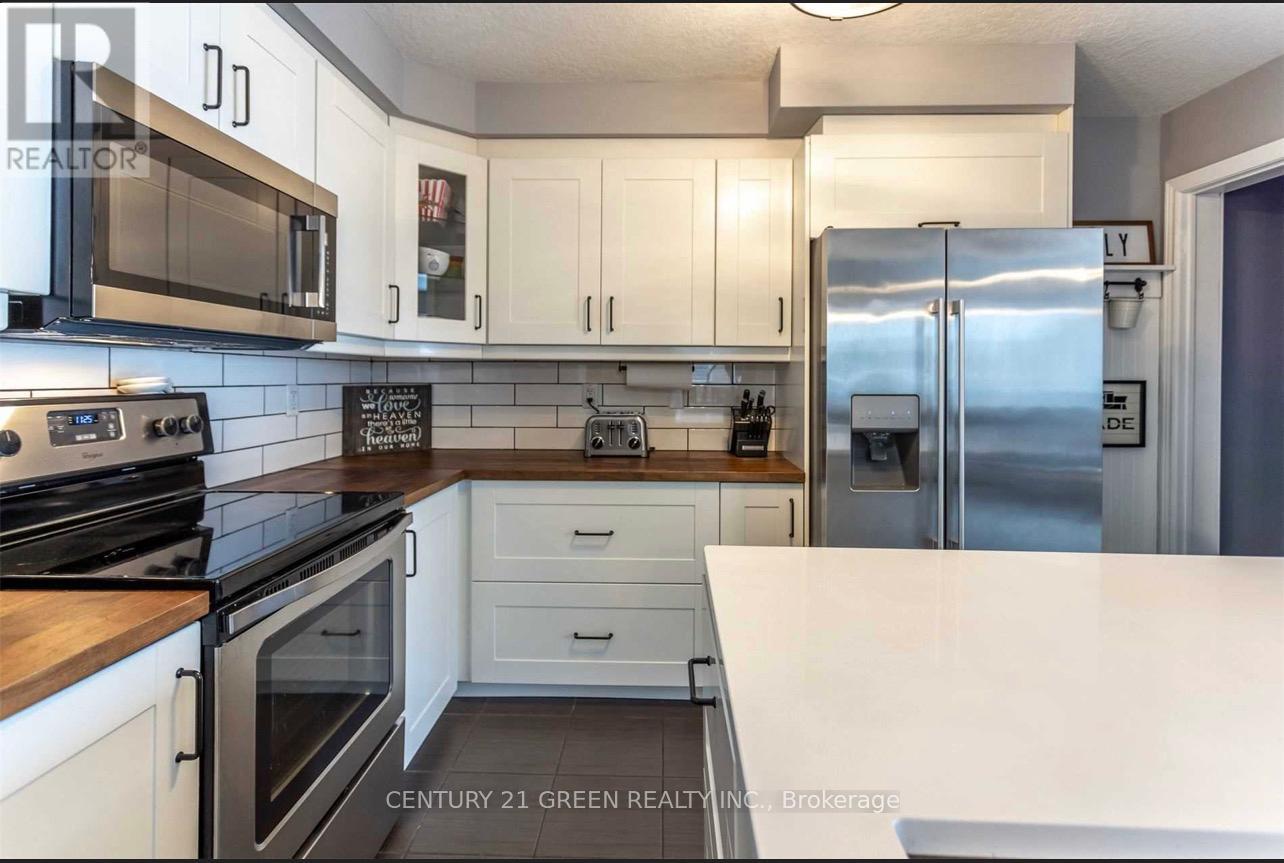 Main - 93 Oakes Crescent, Guelph (Grange Road), Ontario  N1E 0J5 - Photo 5 - X12875234