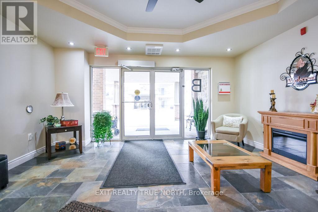 204 - 19b Yonge Street N, Springwater, Ontario  L0L 1P0 - Photo 2 - S12875808