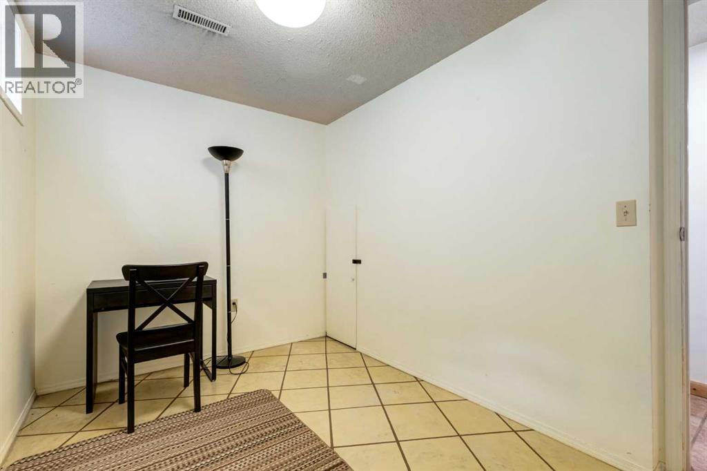 7103 Hunterwood Road Nw, Calgary, Alberta  T2K 4J5 - Photo 37 - A2275637