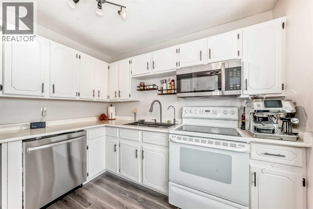 64, 123 Queensland  Se, Calgary, Alberta  T2J 5J4 - Photo 5 - A2292000