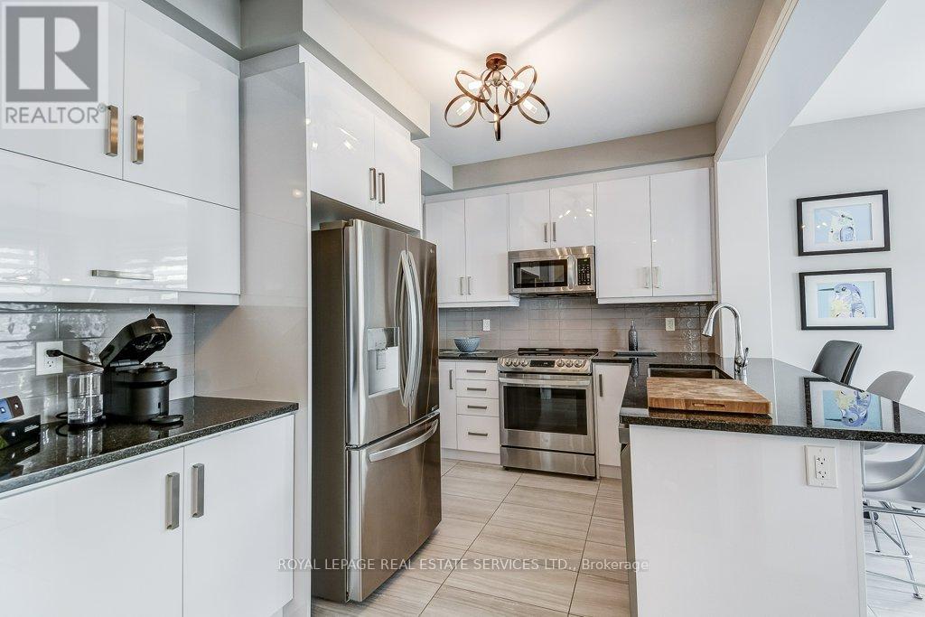 143 Grovewood Common, Oakville, Ontario  L6H 0X5 - Photo 8 - W12876040