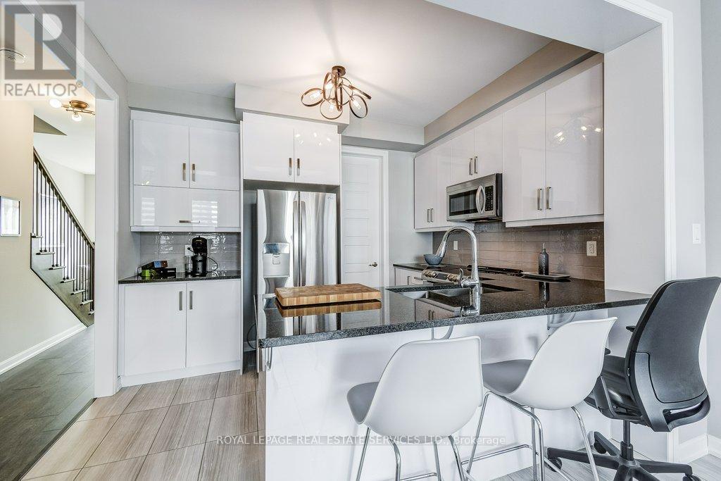 143 Grovewood Common, Oakville, Ontario  L6H 0X5 - Photo 9 - W12876040