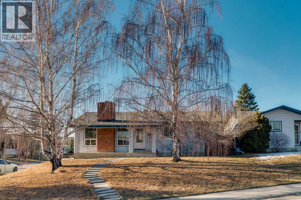 102 Huntham Place Ne, Calgary, Alberta  T2K 4Y6 - Photo 2 - A2280773