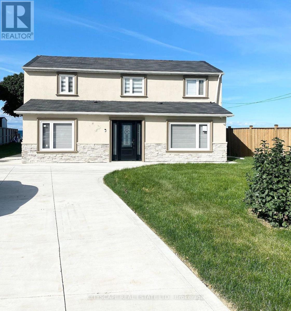 48 Seabreeze Crescent, Hamilton (Lakeshore), Ontario  L8E 5C8 - Photo 2 - X12876368