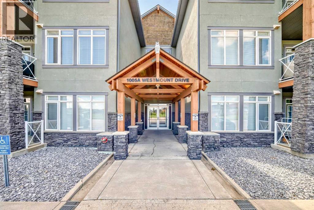 210, 1005a Westmount Drive, Strathmore, Alberta  T1P 0C3 - Photo 1 - A2288244