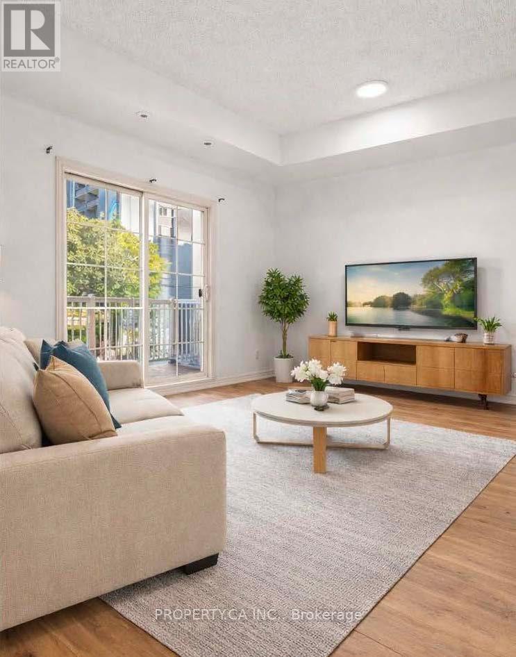 205 - 205 Wellesley Street E, Toronto, Ontario  M4X 1G1 - Photo 2 - C12876398