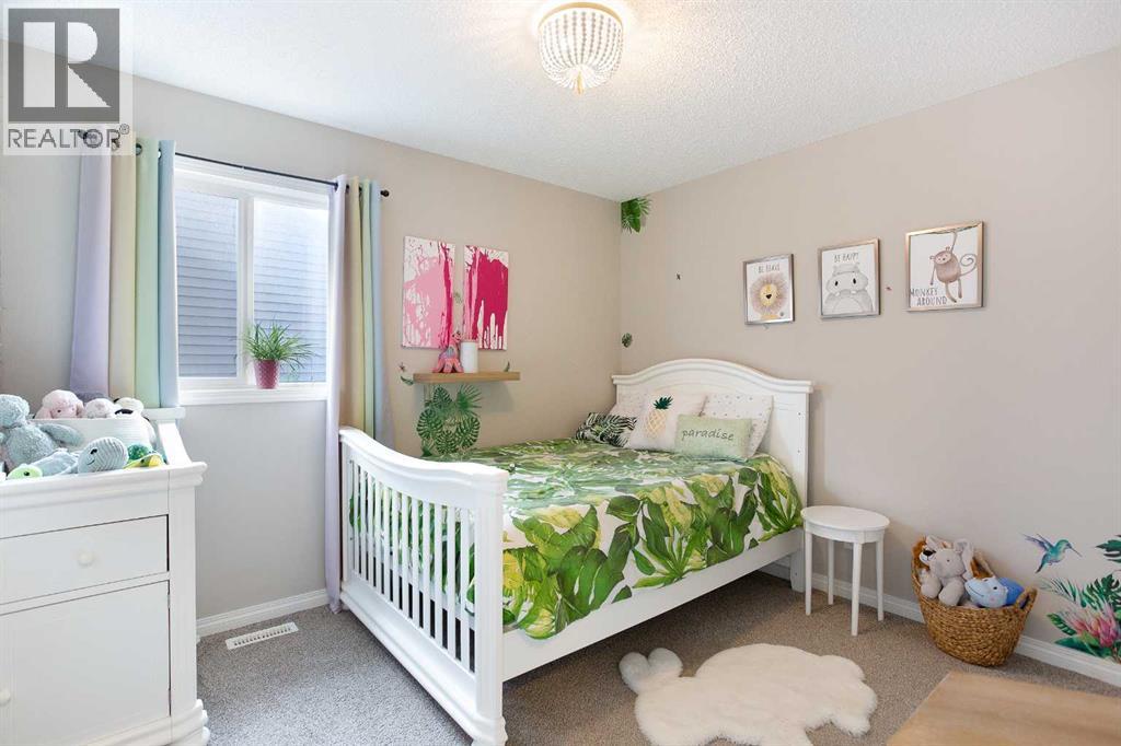 63 Heritage Court, Cochrane, Alberta  T4C 2N5 - Photo 23 - A2288398