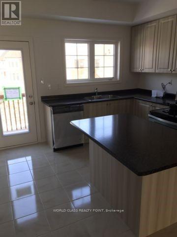 77 Aspen Hill Road, Brampton, Ontario  L6Y 6E5 - Photo 3 - W12876274