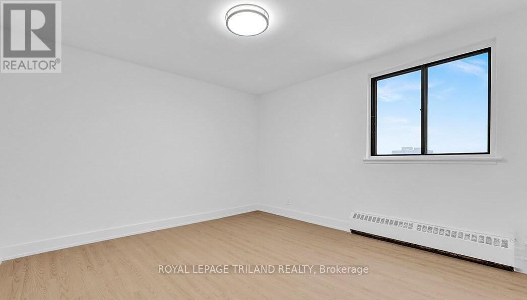 402 - 671 Woolwich Street, Guelph (Riverside Park), Ontario  N1H 3Y9 - Photo 3 - X12876916