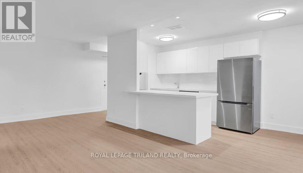 402 - 671 Woolwich Street, Guelph (Riverside Park), Ontario  N1H 3Y9 - Photo 6 - X12876916