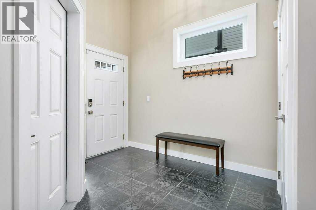 5825 Maple Crescent, Innisfail, Alberta  T4G 0A9 - Photo 4 - A2290502