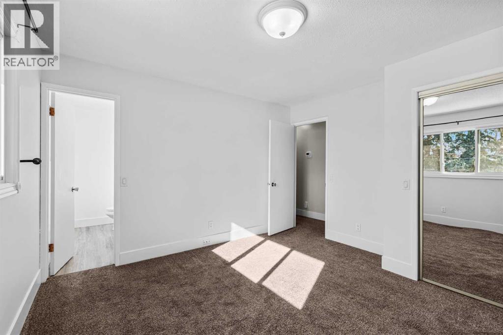 1007 Hunterston Place Nw, Calgary, Alberta  T2K 4N5 - Photo 17 - A2287224