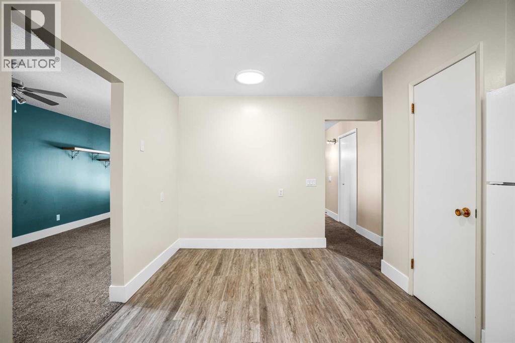 1007 Hunterston Place Nw, Calgary, Alberta  T2K 4N5 - Photo 14 - A2287224