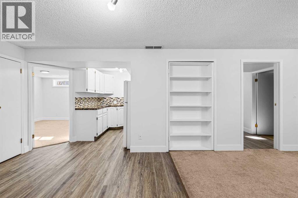 1007 Hunterston Place Nw, Calgary, Alberta  T2K 4N5 - Photo 28 - A2287224