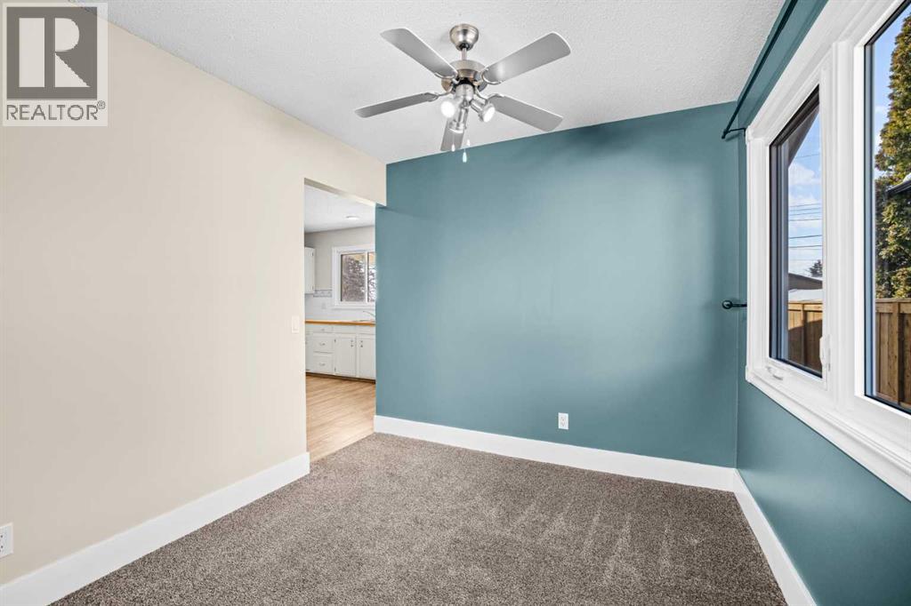 1007 Hunterston Place Nw, Calgary, Alberta  T2K 4N5 - Photo 10 - A2287224