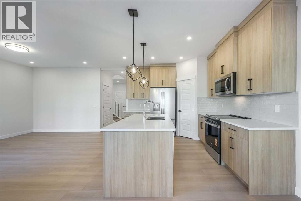 122 Sandpiper Bend, Chestermere, Alberta  T1X 2S8 - Photo 3 - A2292925